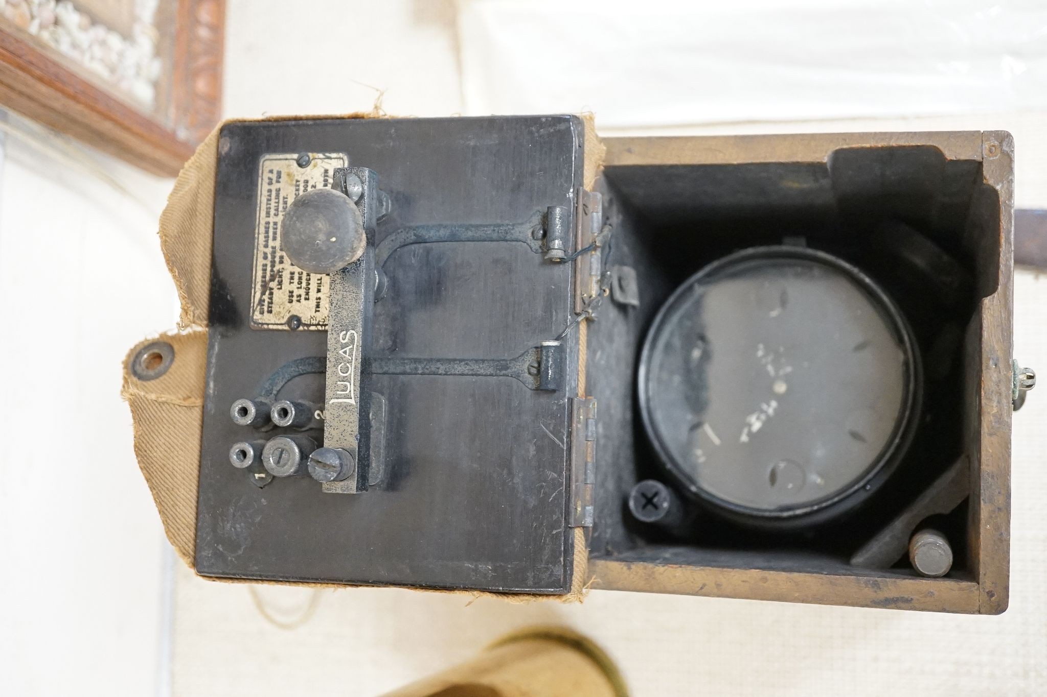 A British WWI Short & Mason compass, two bayonets, cartridge case, Lucas morse code, etc.